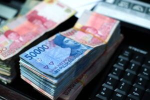 Pile of Indonesian banknotes on the desk