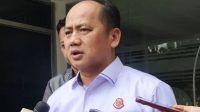 Kepala Pusat Penerangan Hukum (Kapuspenkum) Kejagung Anang Supriatna berbicara dengan awak media di Gedung Kejaksaan Agung,